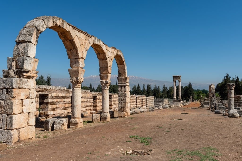 Ancient Umayyad ruins in Anjar, Lebanon, showcasing stone arcades and historical architecture
